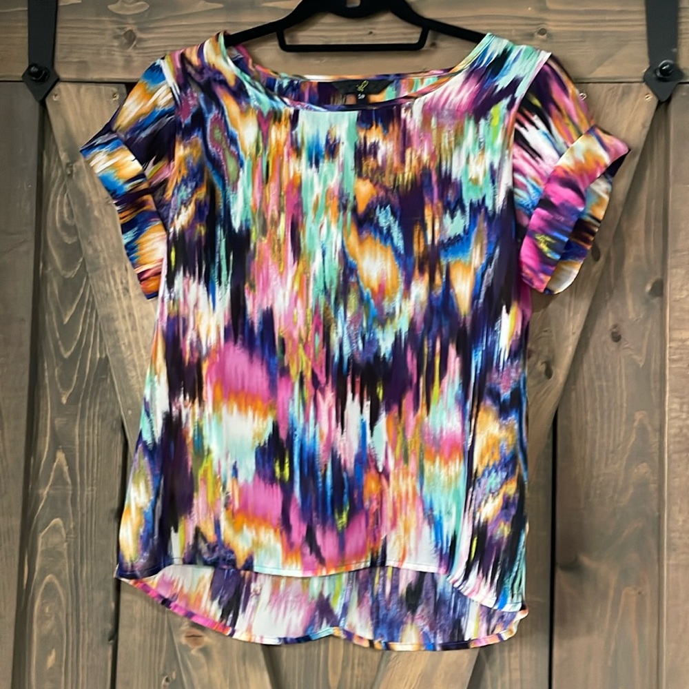 Top with cutouts on the back